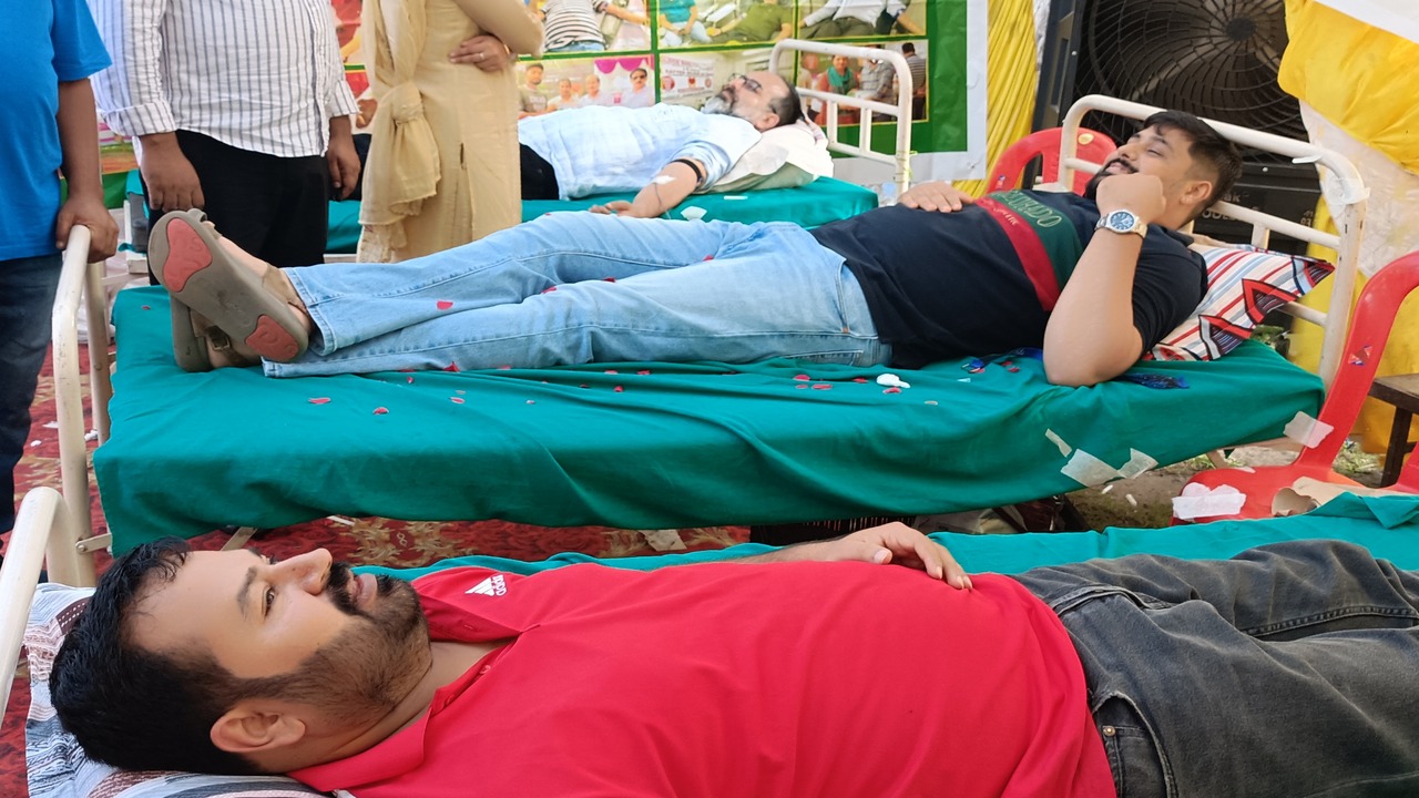 Youth donating blood in Anjuman's blood donation camp
